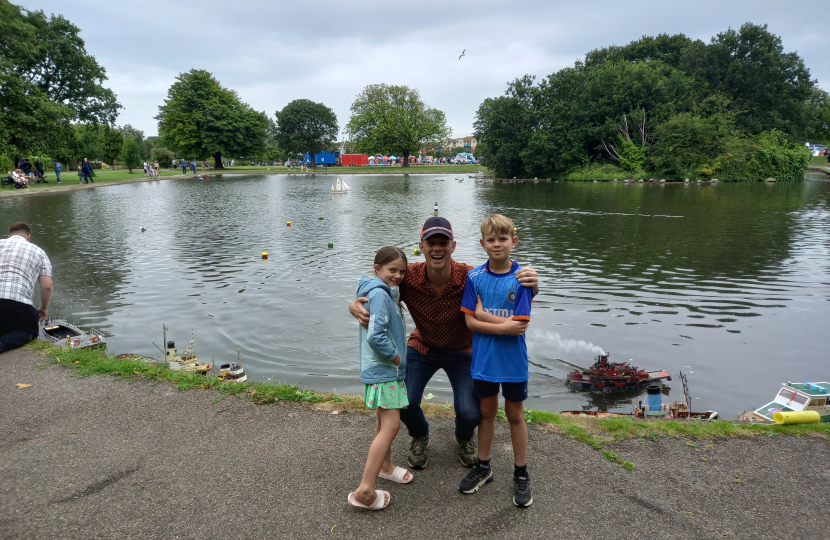 Dan and children at the Memorial Park boat pond regatta