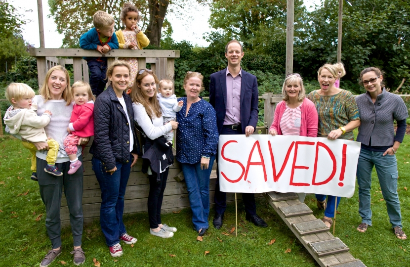 Dan and playgroup celebrate victory at the Romany site