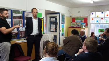 Dan and Michael speaking at the meeting